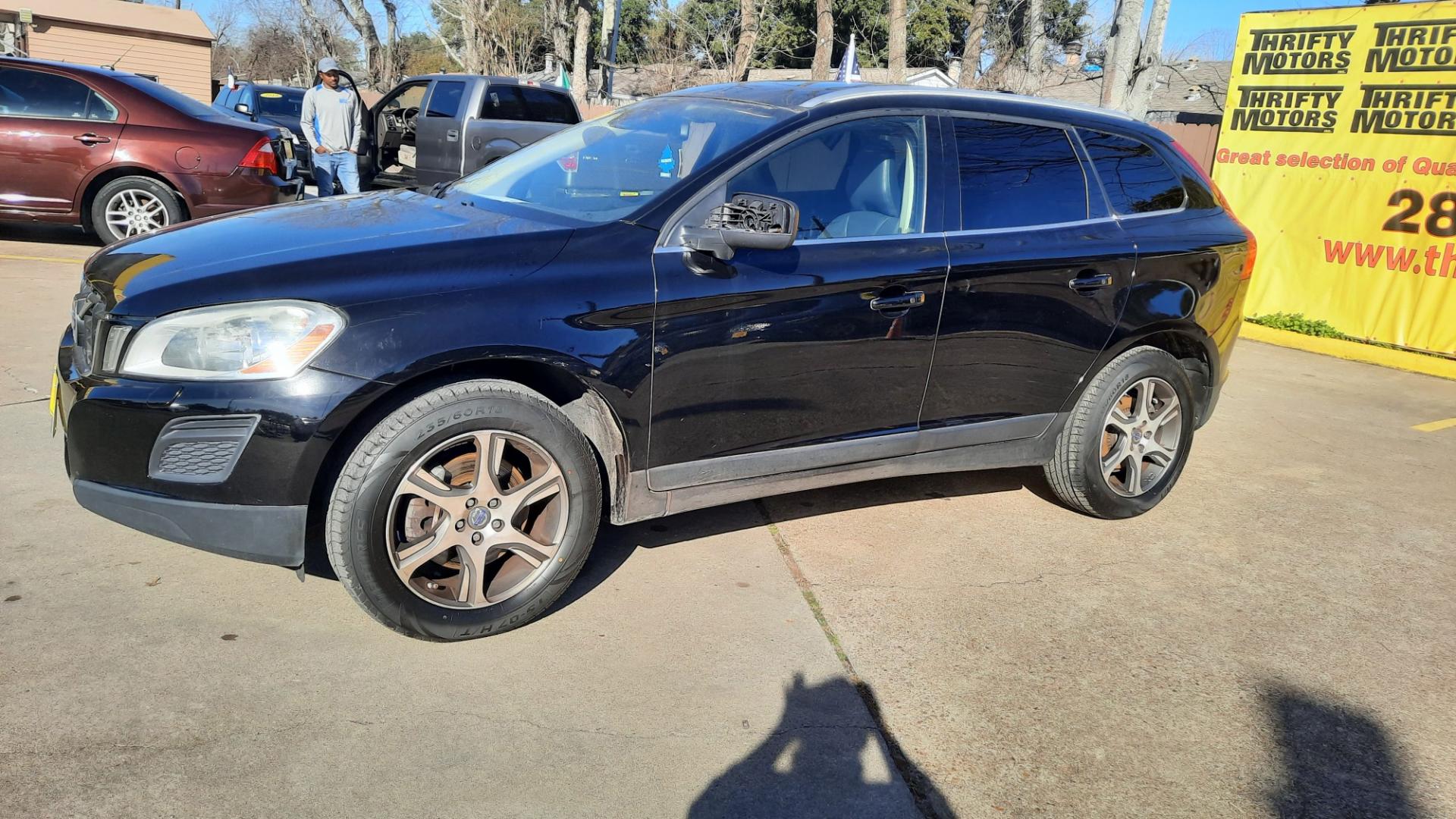 2013 Volvo XC60 (YV4902DZ4D2) , located at 16710 Clay Rd., Houston, TX, 77084, (281) 859-7900, 29.834864, -95.656166 - Photo#2